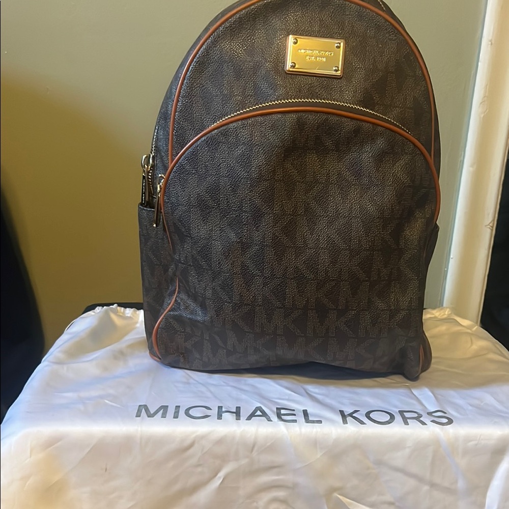 Michael Kors Brown Monogram Backpack with Iconic Design
